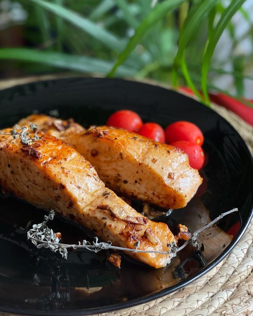 buttered salmon and cherry tomatoes